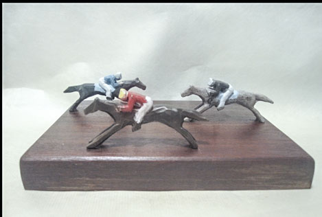 miniature bronze 3 horses and riders 